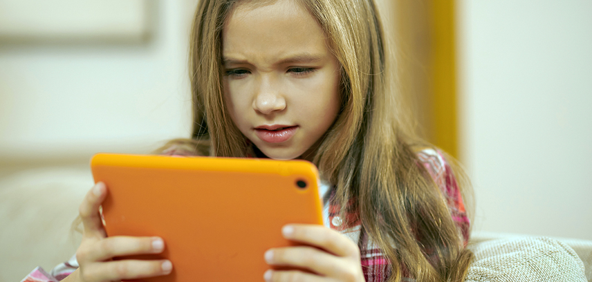 2024-08- Is Gacha Life safe for kids__InsideImage Young girl using tablet